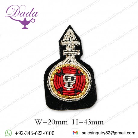 brooches are embroidered by hand