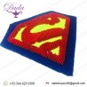 Superman brooch