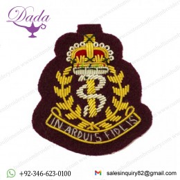 ramc officers beret cap badges. army bullion wire on maroon